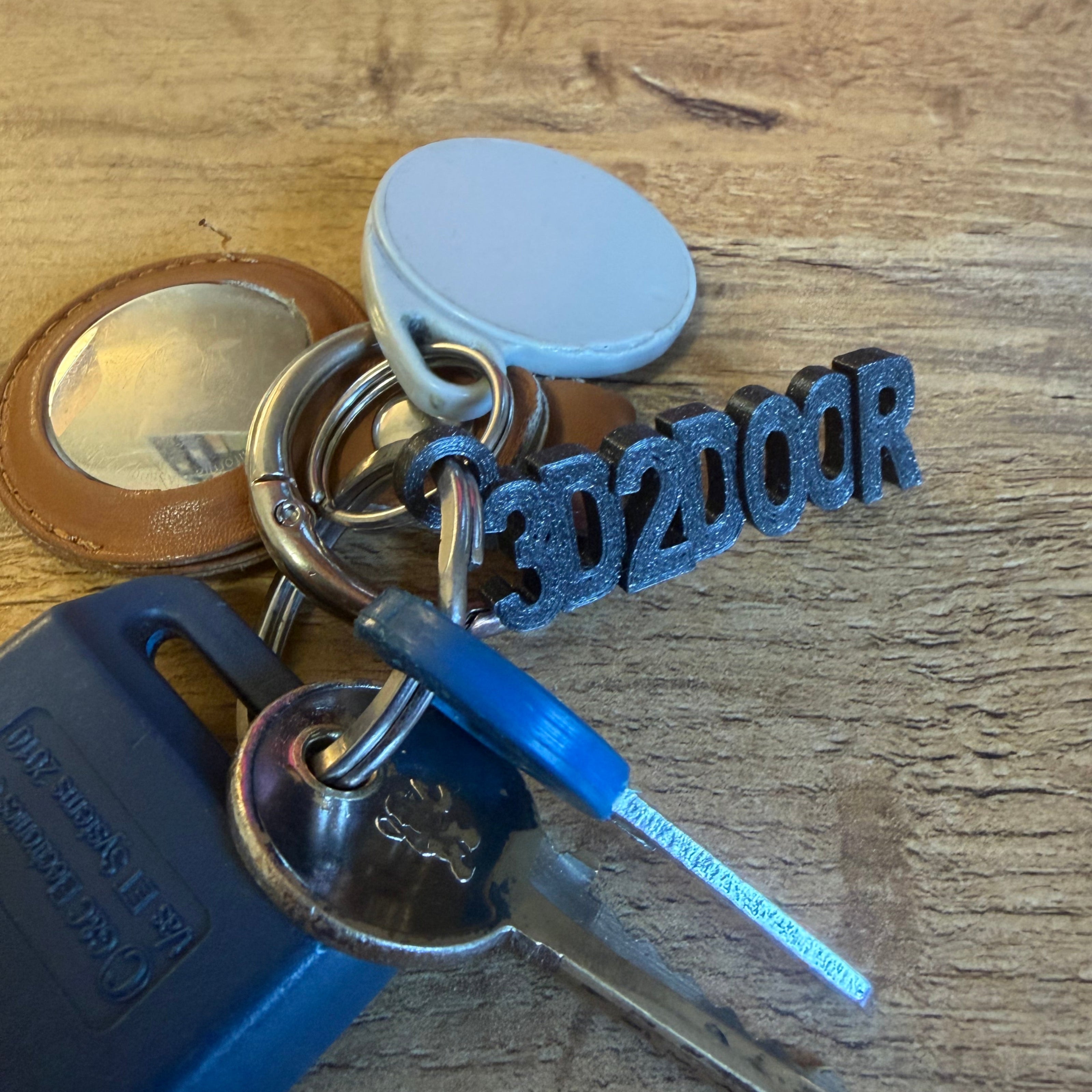 Keychain and Nametag are attached with keys that are not included